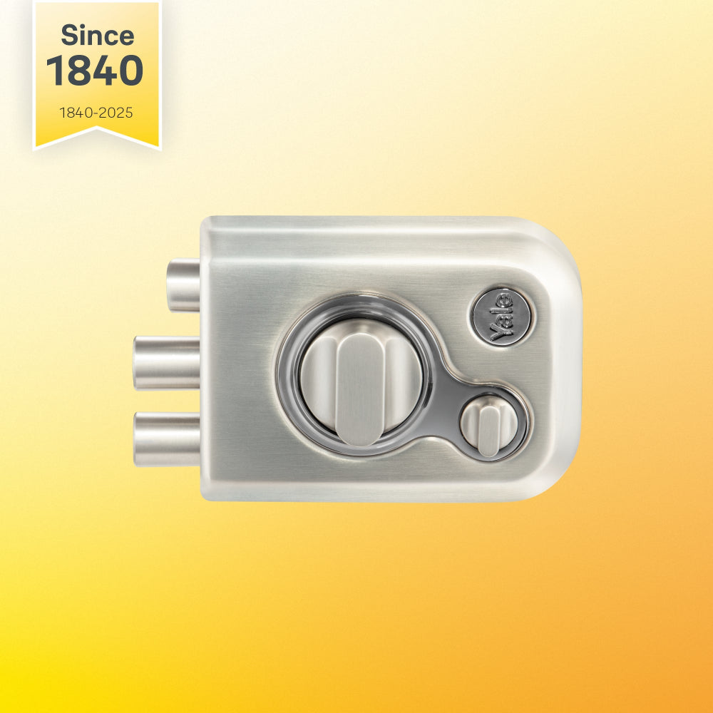 Yale Kratos RIM lock for main door with latch and two deadbolts and knob inside in silver